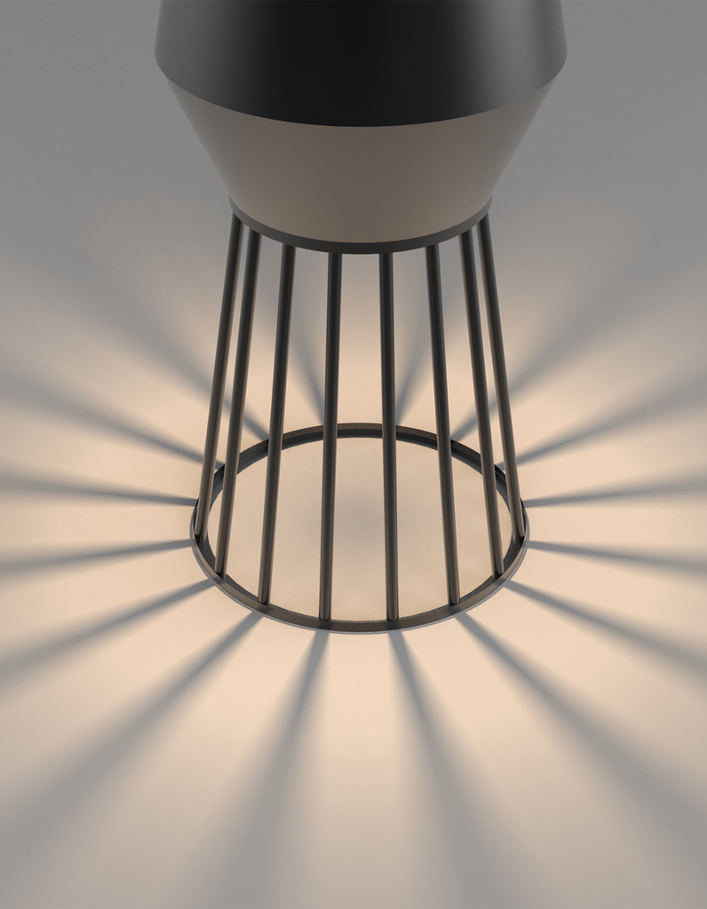 Beam table lamp casting artistic light shadows on a modern interior / مصباح طاولة بتصميم عصري يصنع ظلالًا فنية أنيقة داخل المساحات الداخلية