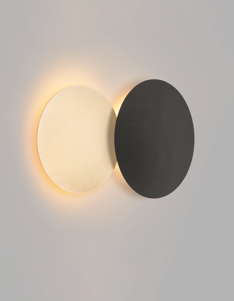 Dual circle wall lamp with indirect glow creating a modern decorative accent / مصباح حائط بدائرتين متناسقتين يبعث إضاءة غير مباشرة بطابع عصري
