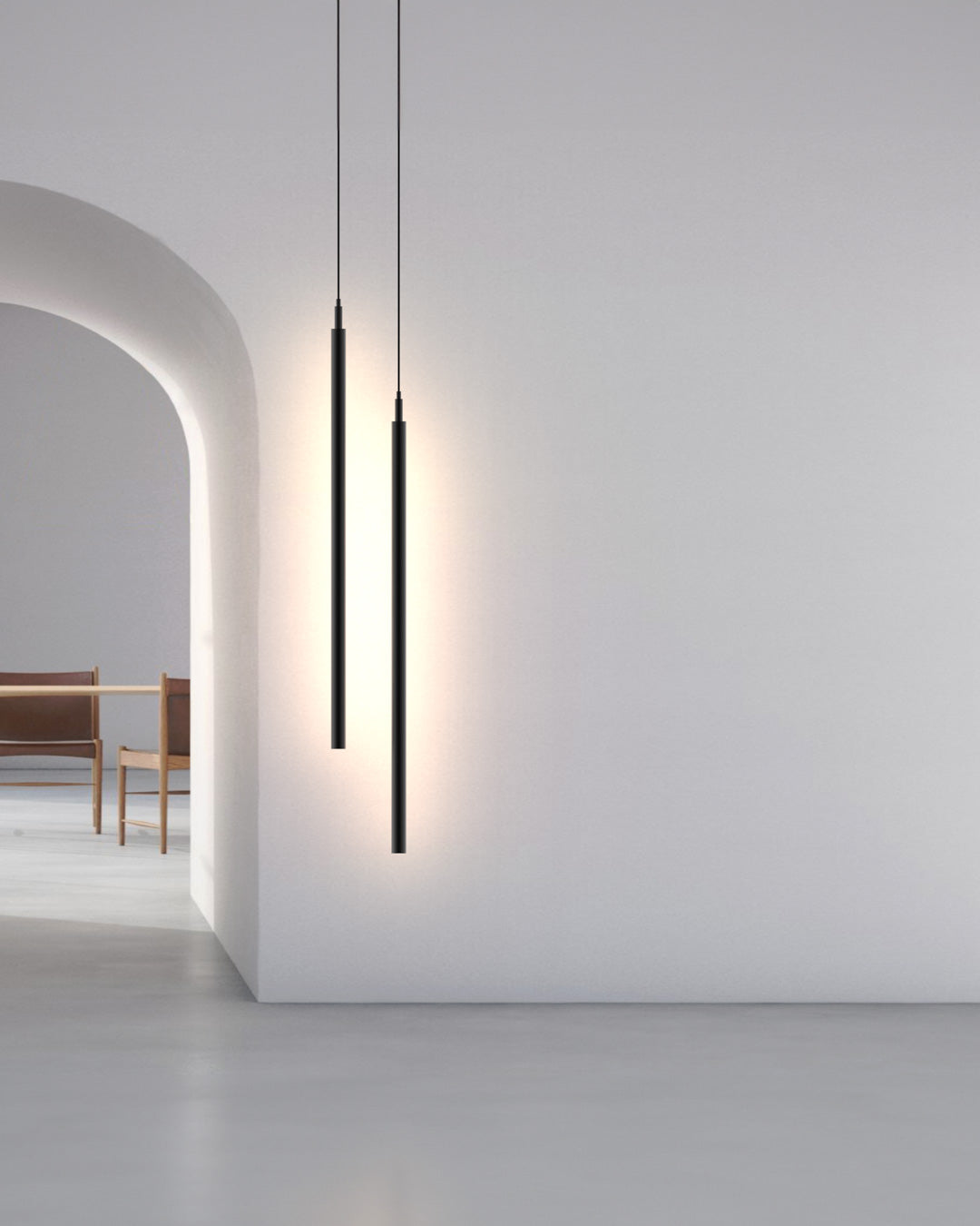 Slight vertical pendant with elongated slim design creating soft ambient lighting / إضاءة معلقة عمودية بتصميم طولي نحيف تضيف إضاءة هادئة ولمسة عصرية