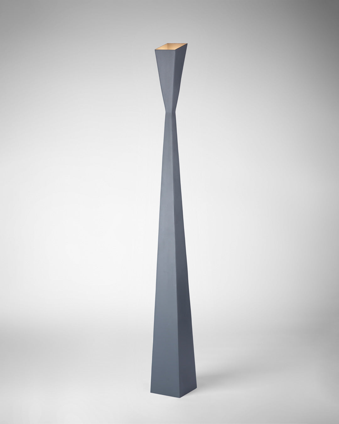 Aura floor lamp with slim modern profile casting soft ambient light / مصباح أرضي بتصميم أنيق ونحيف يوفّر إضاءة هادئة ولمسة عصرية