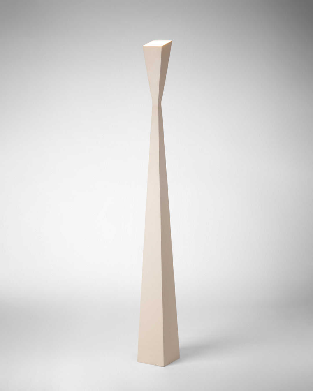 Aura floor lamp with slim modern profile casting soft ambient light / مصباح أرضي بتصميم أنيق ونحيف يوفّر إضاءة هادئة ولمسة عصرية