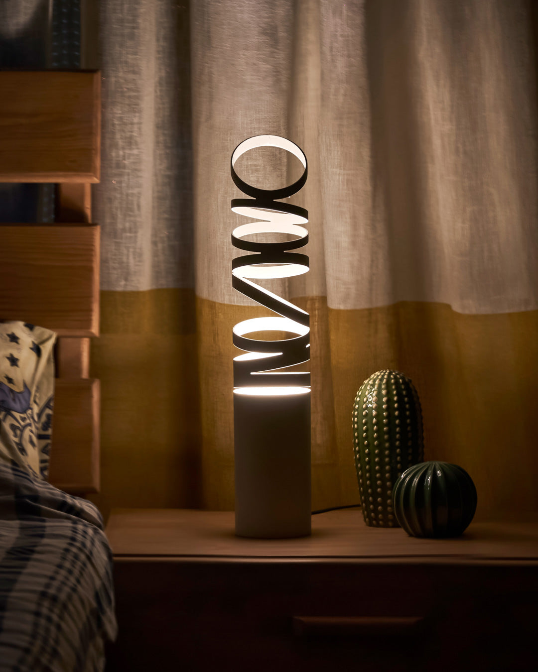 Whirl table lamp with playful contemporary design and soft ambient lighting | مصباح طاولة ويرل بتصميم معاصر مرح وإضاءة ناعمة للمساحات الحديثة