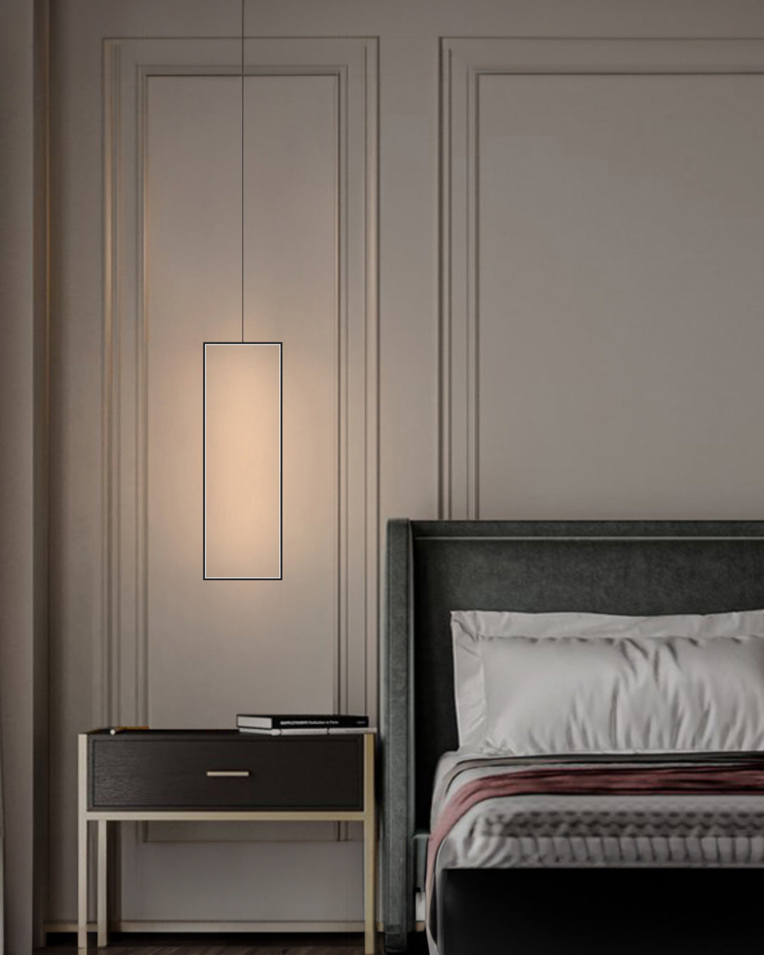 Bound pendant light with suspended modern form emitting warm ambient glow / إضاءة معلقة بتصميم معلق عصري تبعث توهجًا دافئًا يضيف لمسة أنيقة