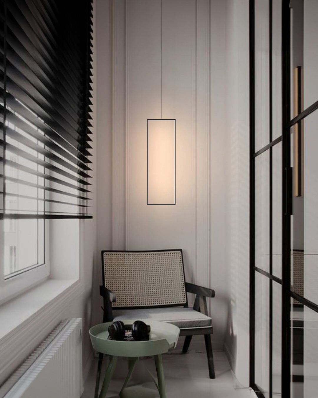 Bound pendant light with suspended modern form emitting warm ambient glow / إضاءة معلقة بتصميم معلق عصري تبعث توهجًا دافئًا يضيف لمسة أنيقة