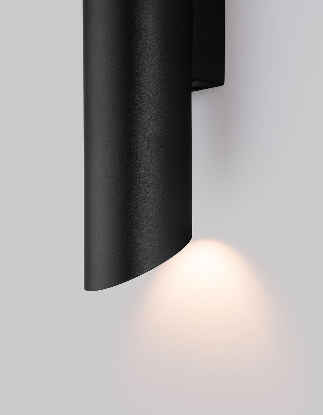 Inverse wall lamp with modern stainless steel form creating soft indirect ambient light / مصباح حائط بتصميم عصري من الستانلس ستيل يمنح إضاءة غير مباشرة هادئة