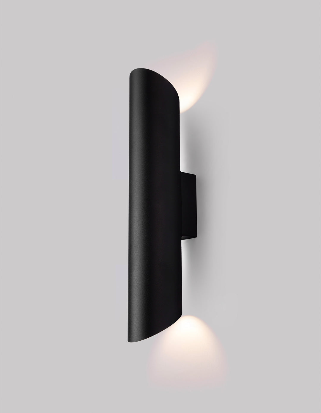 Inverse wall lamp with modern stainless steel form creating soft indirect ambient light / مصباح حائط بتصميم عصري من الستانلس ستيل يمنح إضاءة غير مباشرة هادئة