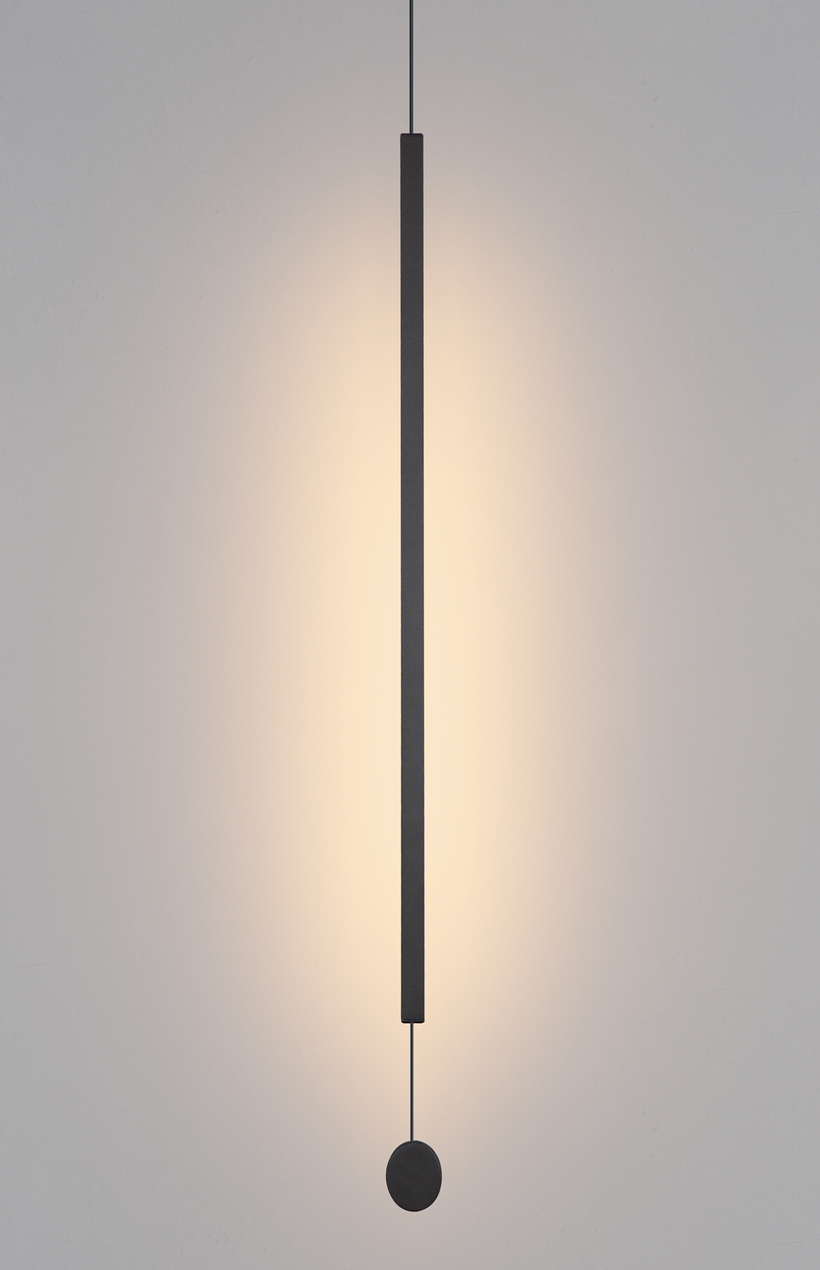 Lines pendant light with slim vertical black design creating warm ambient lighting / إضاءة معلقة بتصميم خطي نحيف باللون الأسود تضيف إضاءة دافئة ولمسة عصرية