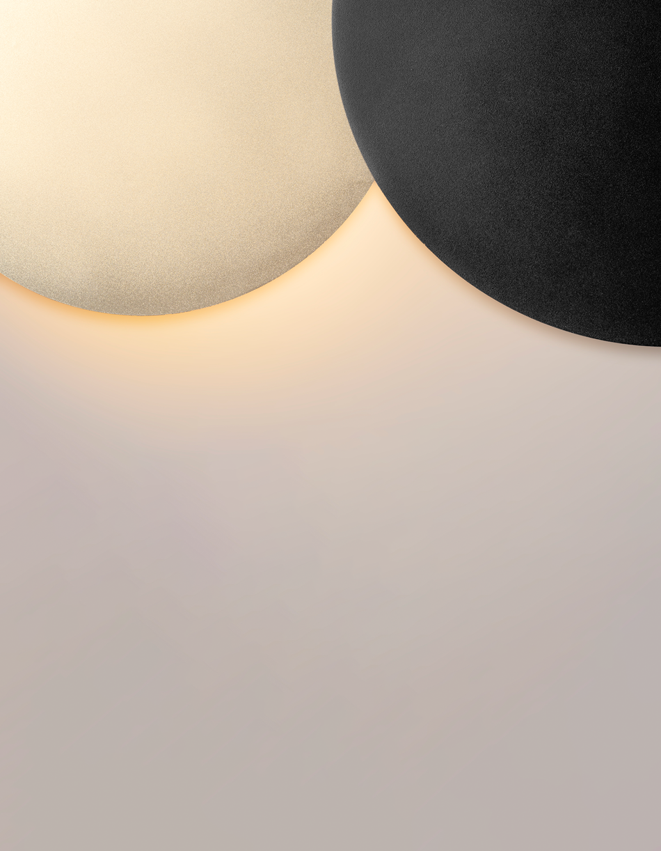 Dual circle wall lamp with indirect glow creating a modern decorative accent / مصباح حائط بدائرتين متناسقتين يبعث إضاءة غير مباشرة بطابع عصري