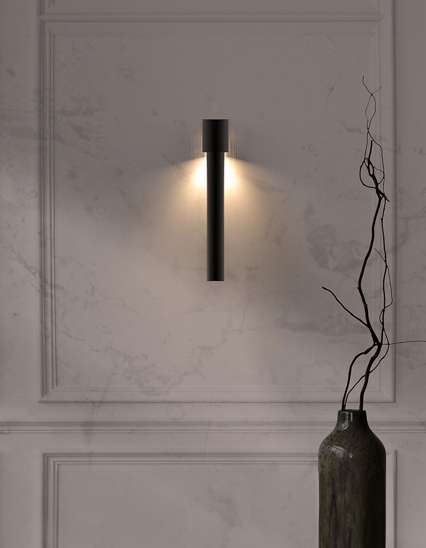 Dew inspired wall lamp with soft glowing glass form on a modern wall / مصباح حائط بتصميم مستوحى من قطرات الندى يبعث إضاءة ناعمة على الجدار